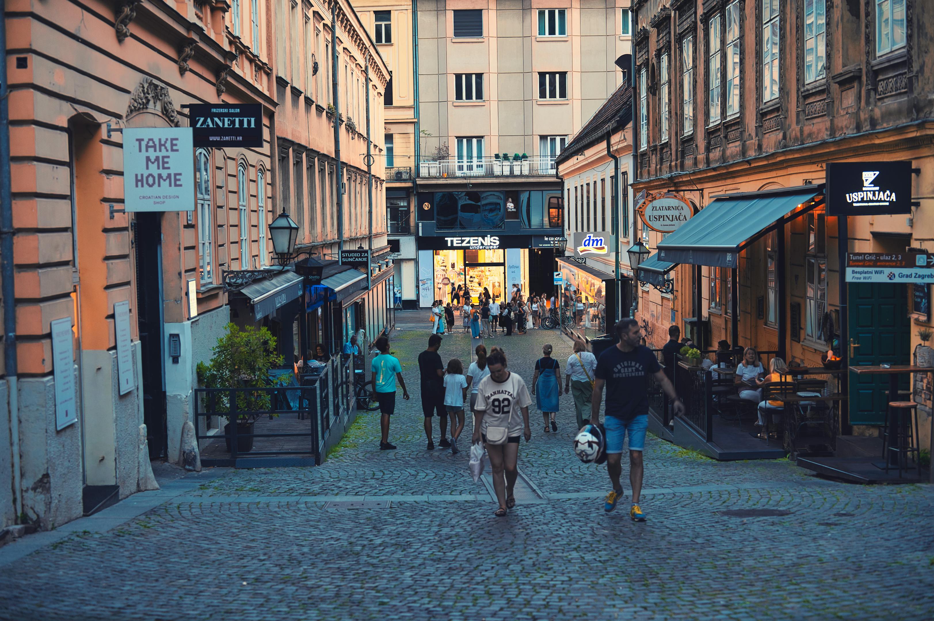 Busy pedestrian street in downtown Zagreb, Croatia, bustling with people enjoying the evening vibe