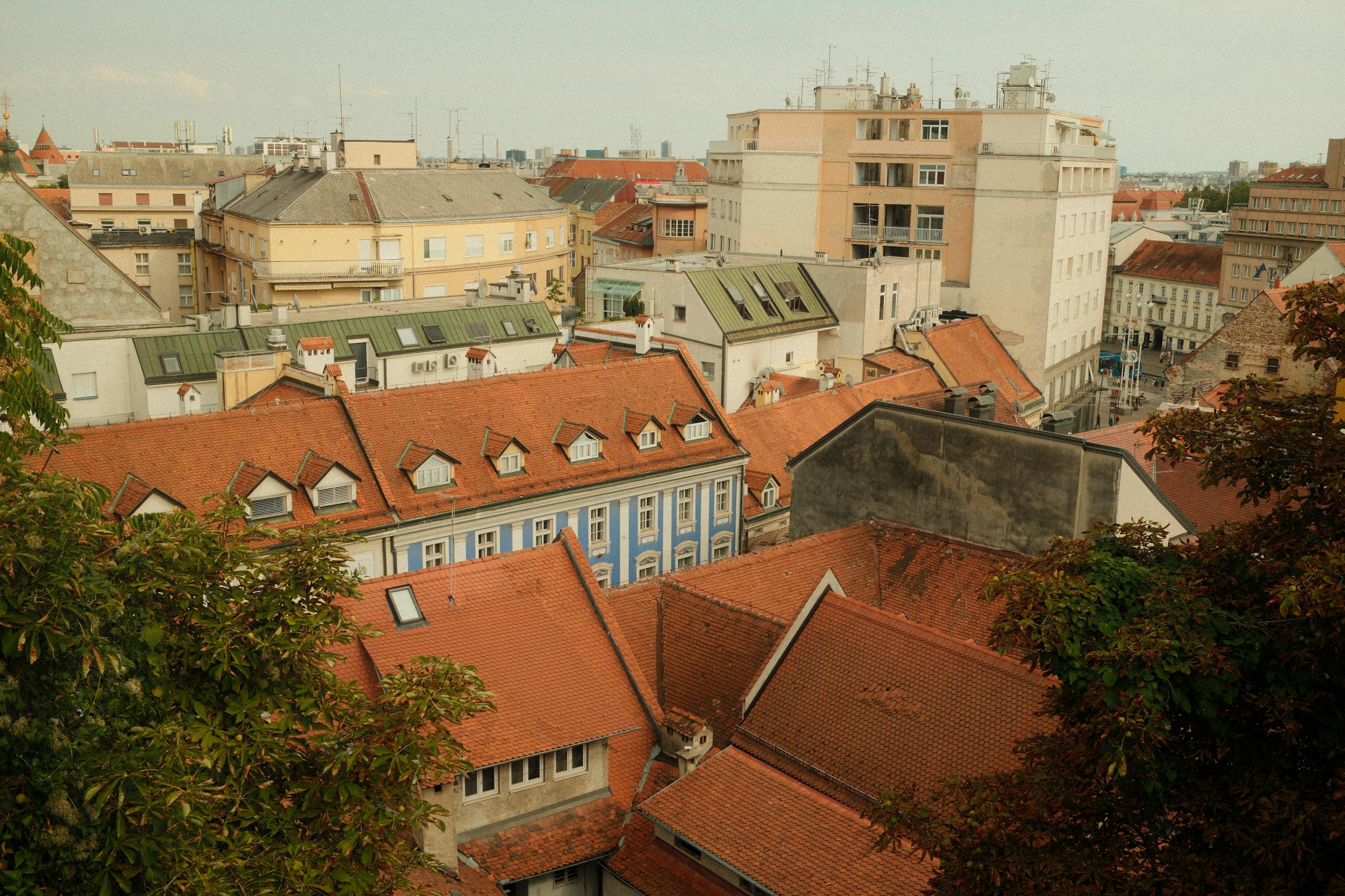 Capture the essence of Zagreb with a stunning view of traditional red-tile rooftops and historic buildings